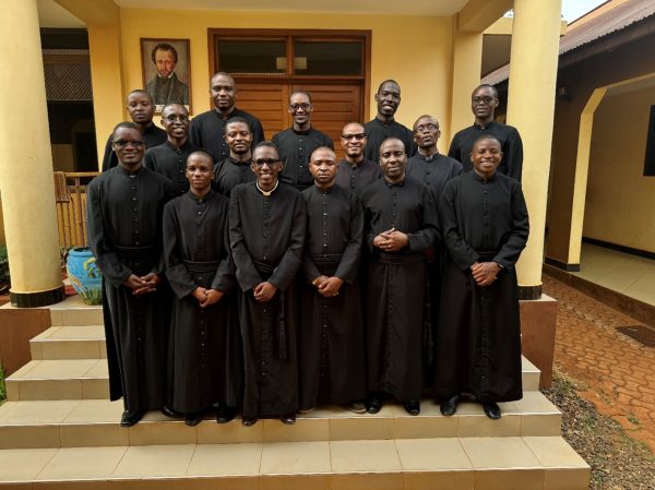 Seminarians and Br. Michael. In the front row (from left to right): Brayan (3rd year theology), Selestine (2nd year theology), Francis (2nd year theology), Valentino (1st year theology), Emmanuel (4th year theology, perpetual vows), Joseph (1st year philosophy). In the middle row (from left to right): Gervas (2nd year theology), Petro (2nd year theology), Br. Michael (Alphagems Secondary School), Vitalis (4th year theology, perpetual vows). In the back row (from left to right): Livinus (1st year theology), Mario (3rd year theology), Joseph (3rd year theology, perpetual vows), Paschal (1st year philosophy), Karoli (1st year philosophy).